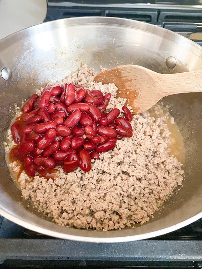 add beans to meat
