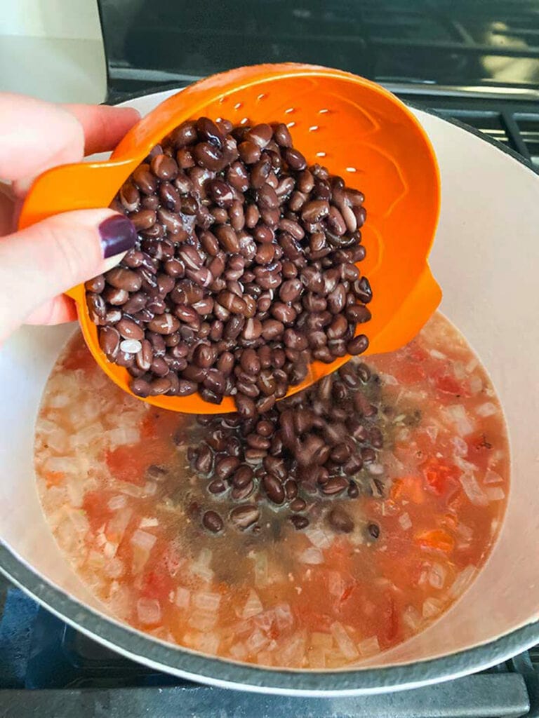add rinsed and drained clack beans to pot