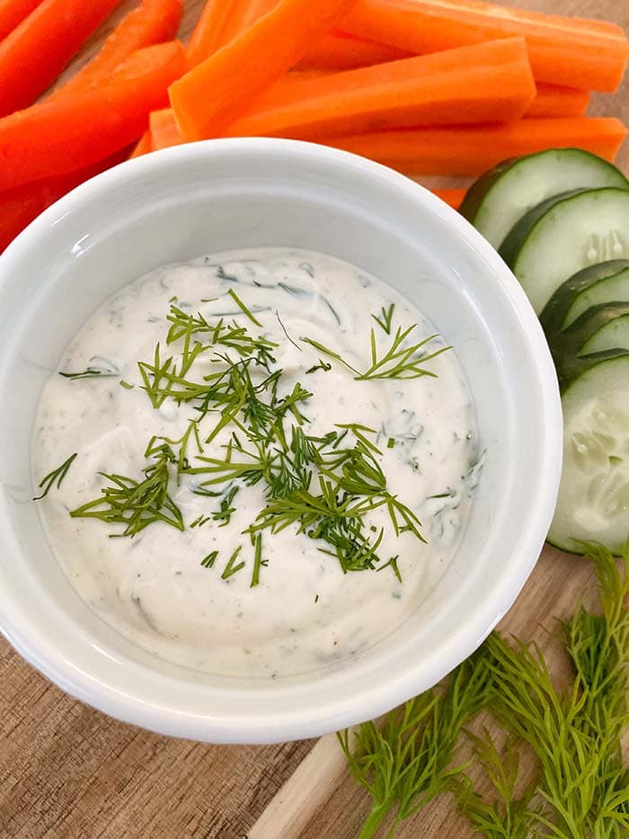 greek yogurt ranch dip with veggies on side