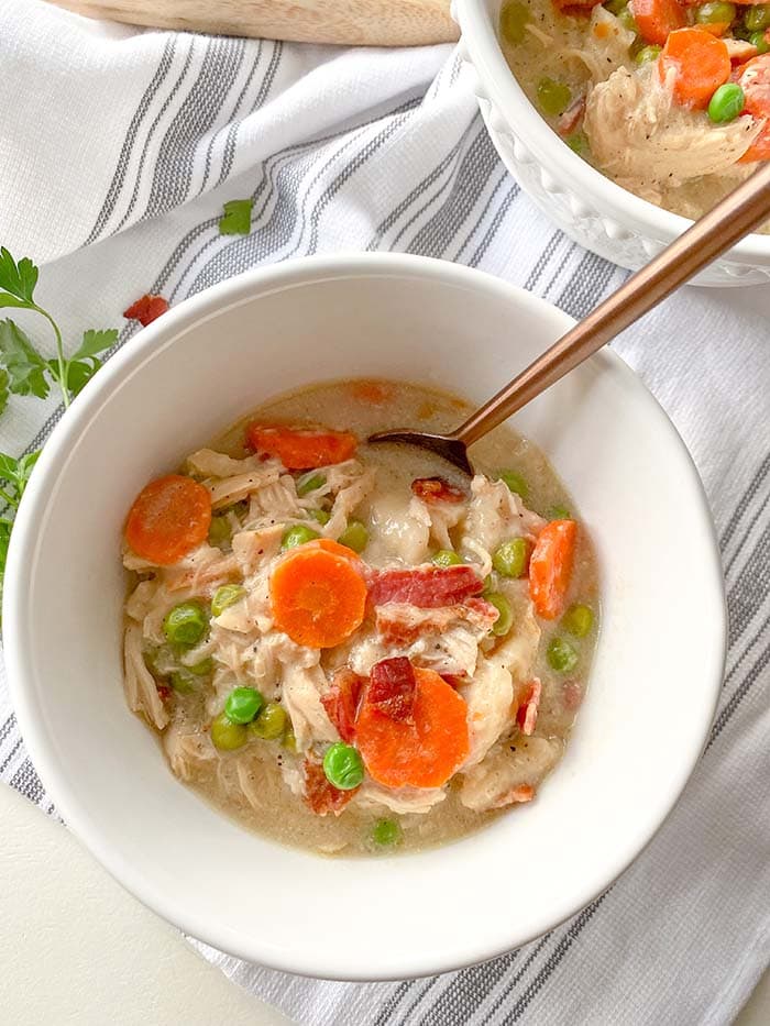 chicken and dumpling soup in bowls