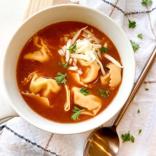 Easy Tortellini Soup in bowl with spoon