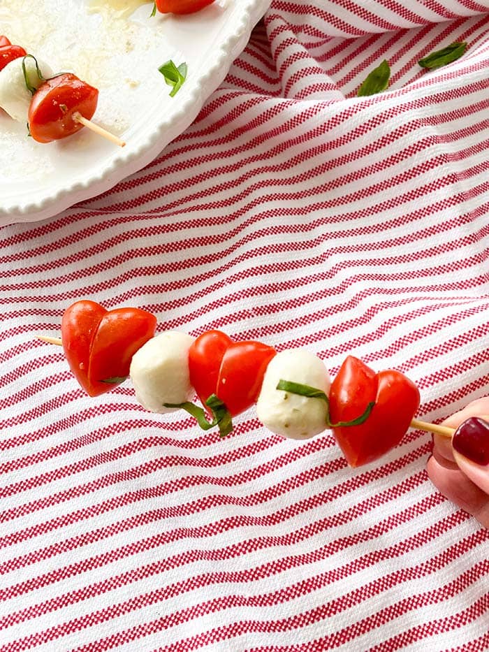 valentine caprese skewers with red and white towel