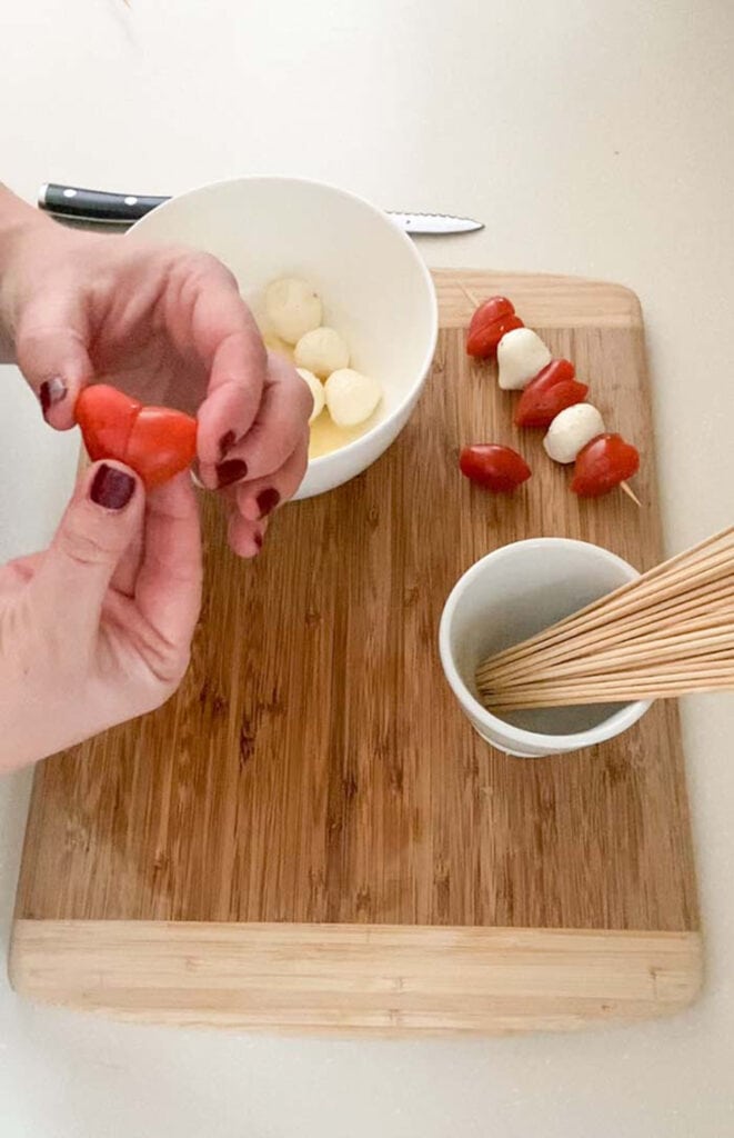constructing the heart for valentines caprese skewers