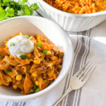 enchilada pasta bake served in a white bowl