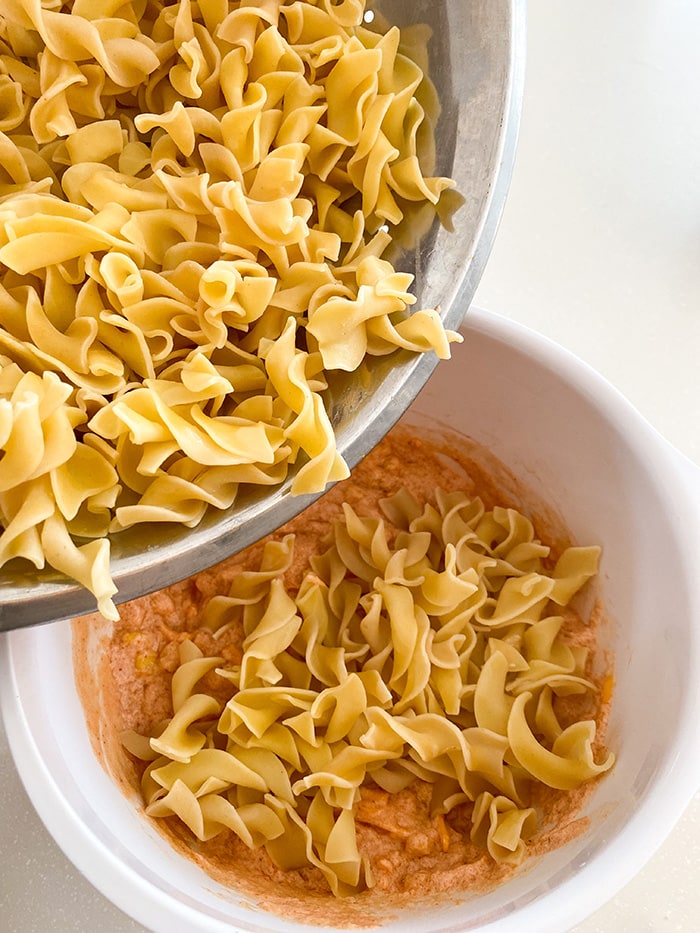 add pasta to sauce mixture