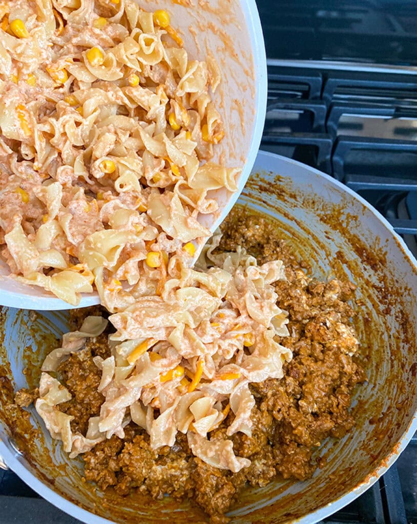 adding noodle mixture into meat