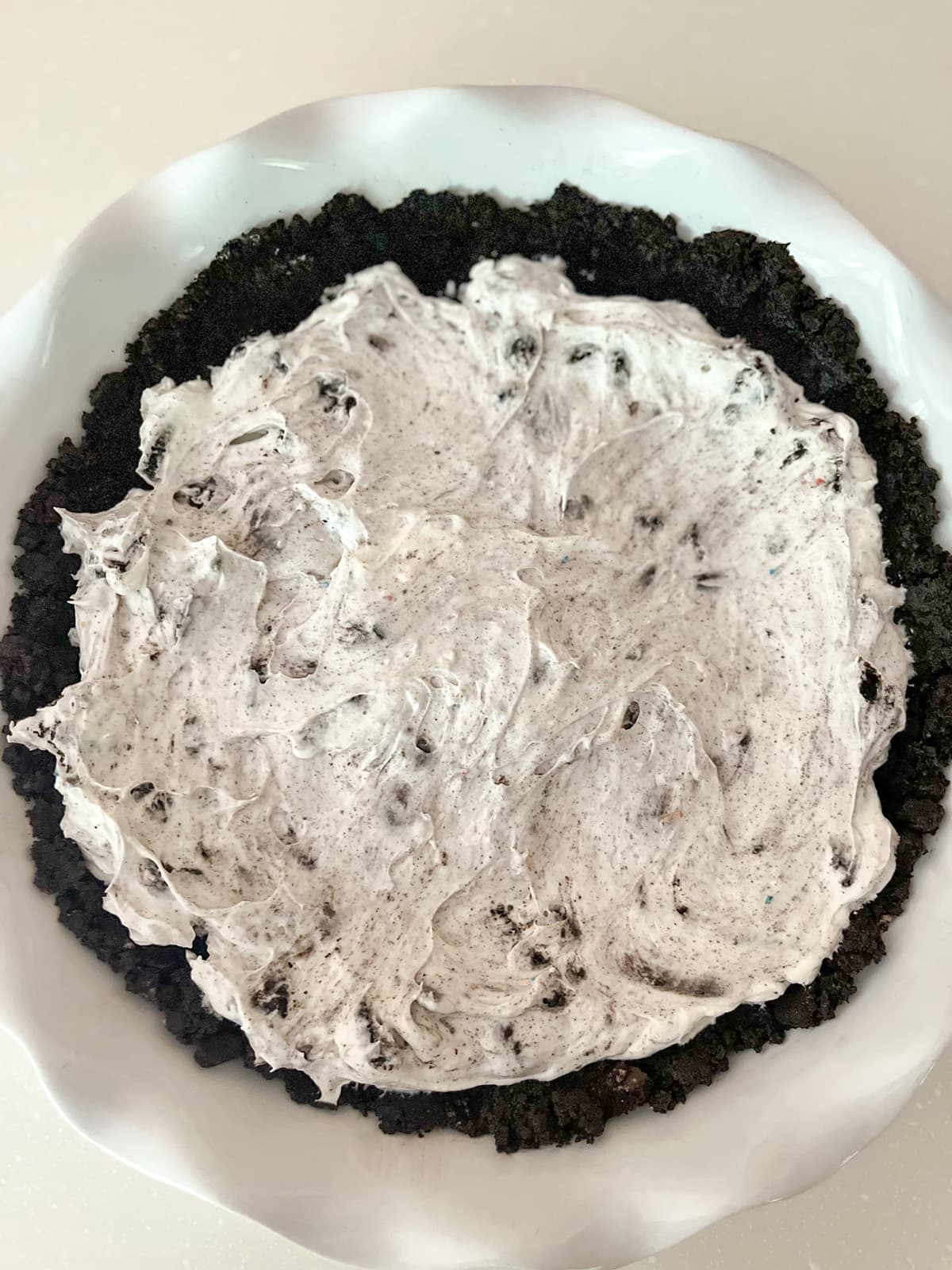 add whip filling to pie crust for4th of July No Bake Oreo pie