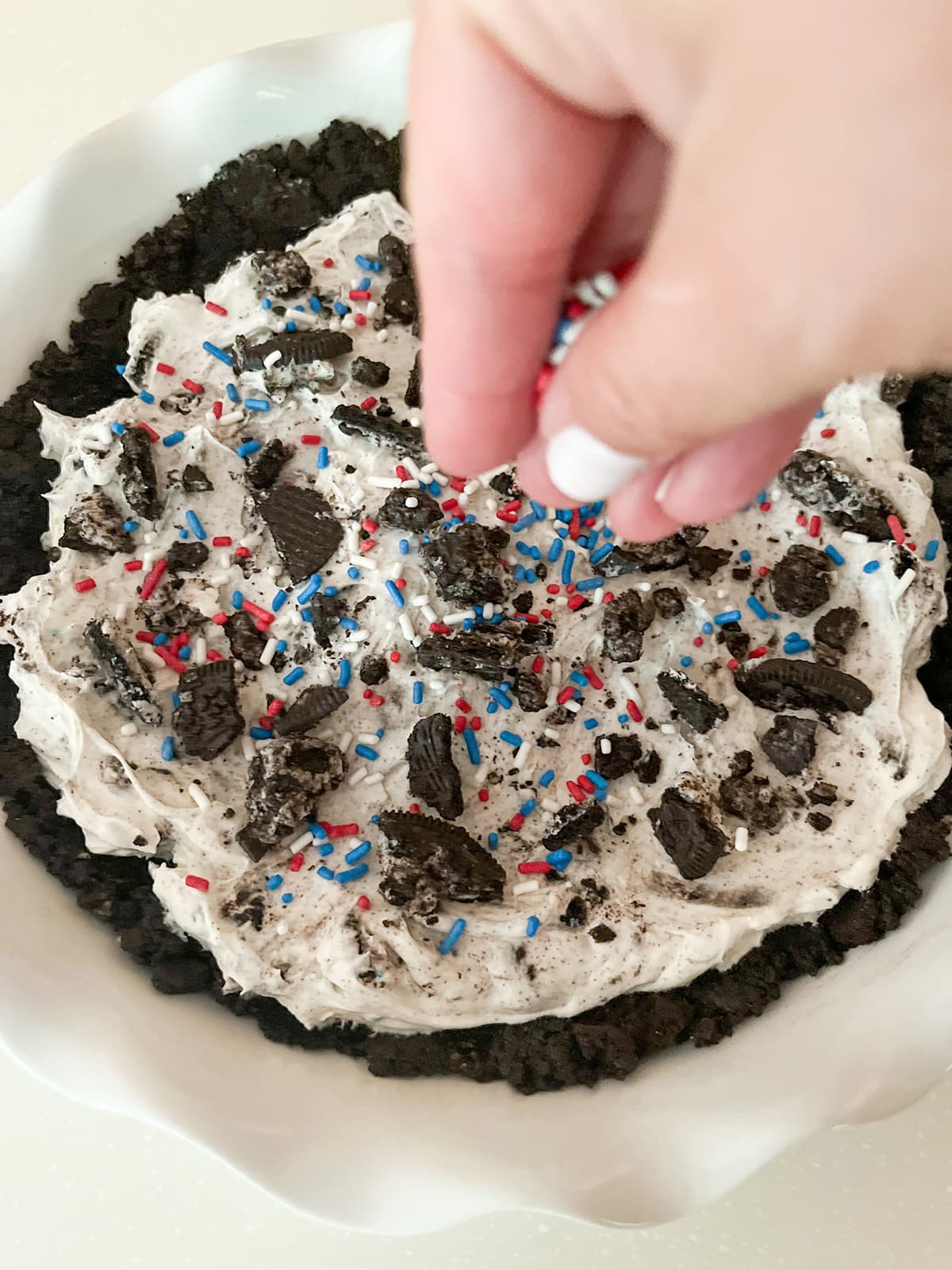use red, white and blue sprinkles for4th of July No Bake Oreo pie