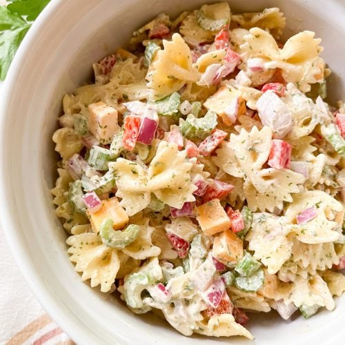 bow tie pasta salad in a serving bowl