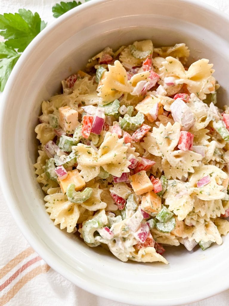 bow tie pasta salad in a serving bowl