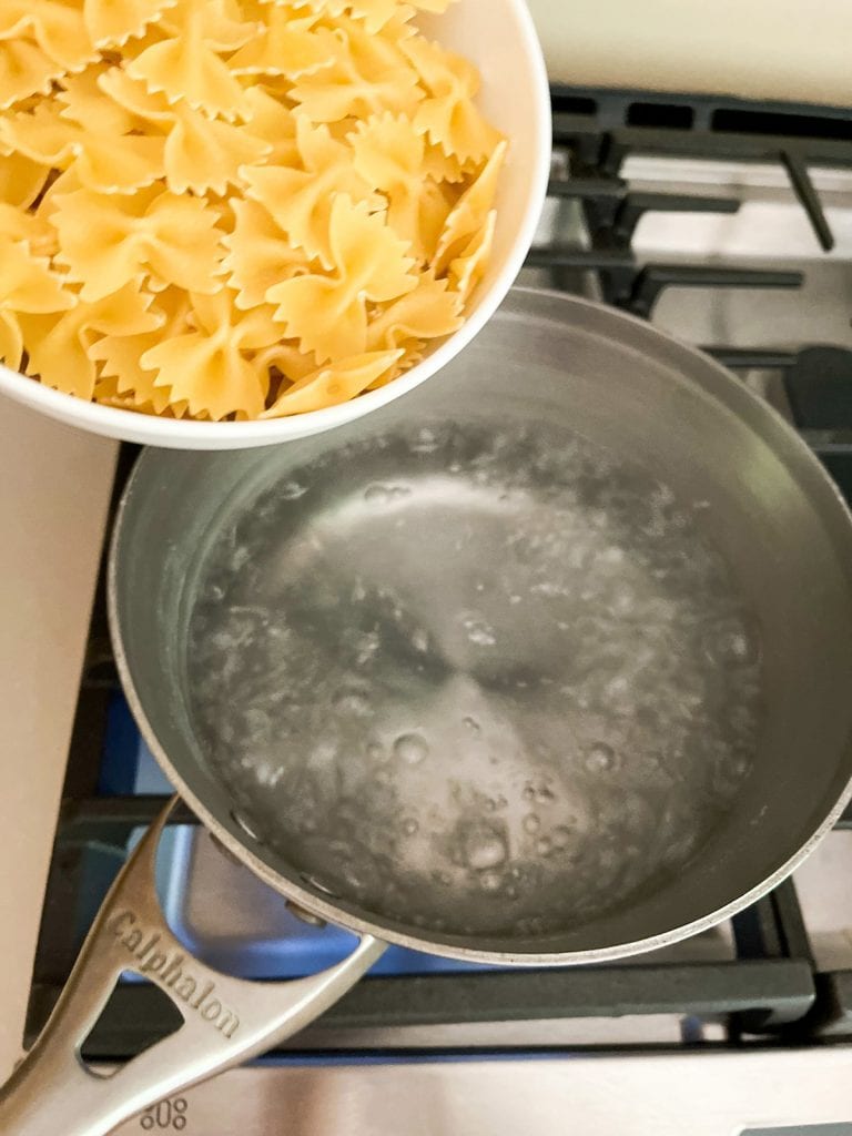 add bow tie pasta to boiling salt water