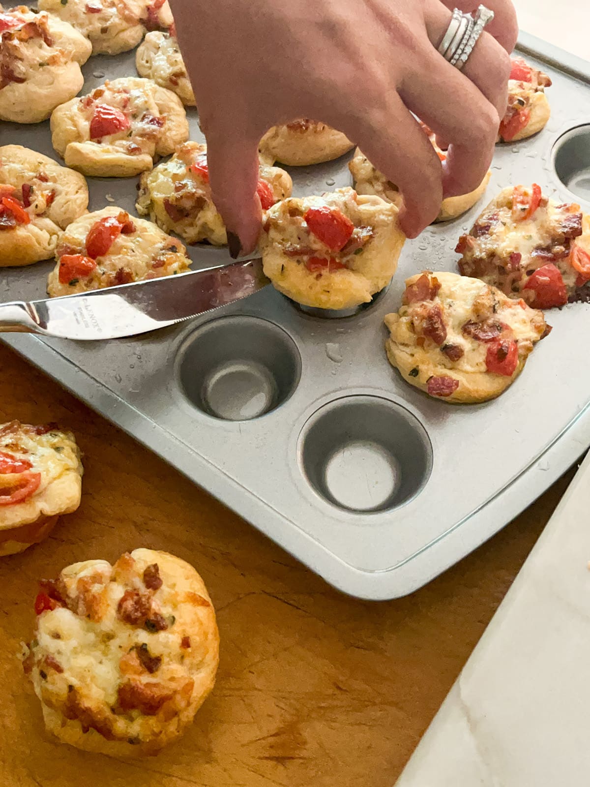 use knife to lift BLT Bites out of muffin tin to cool