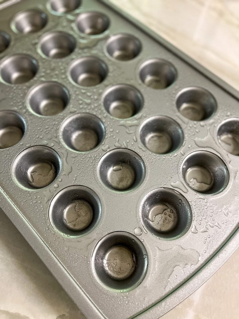 spray mini muffin tin with cooking spray