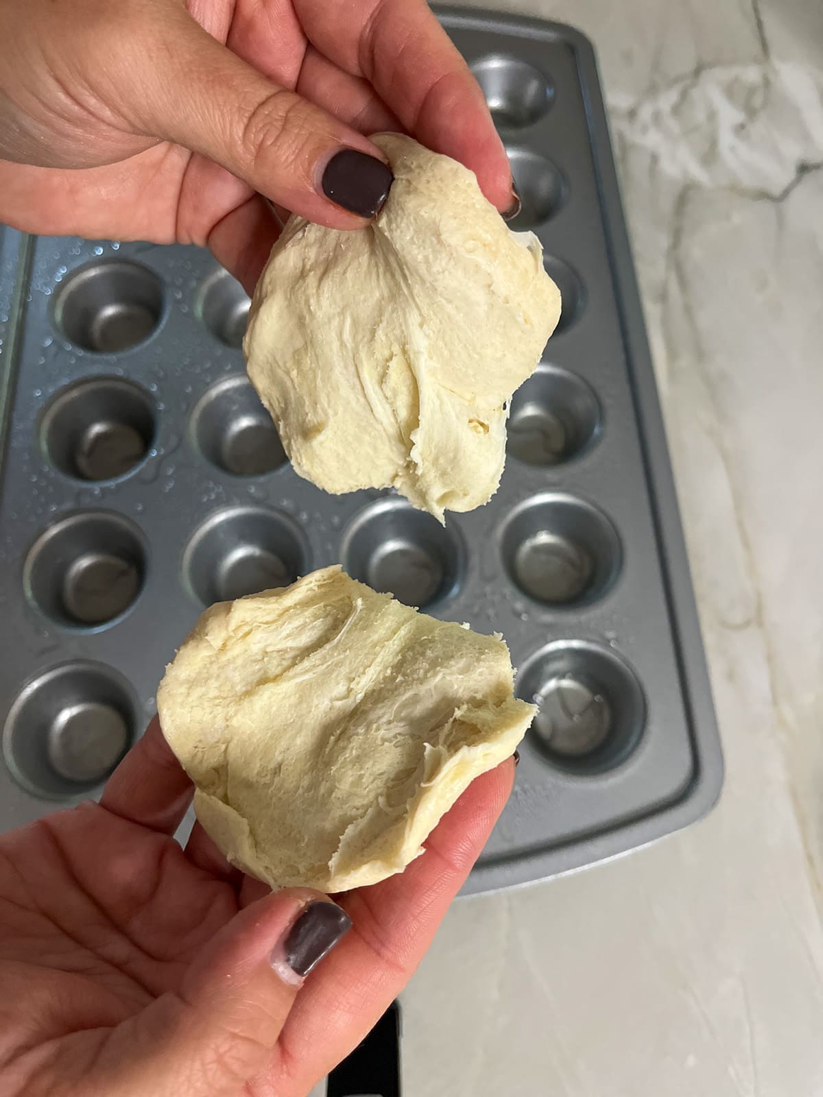 split biscuit dough apart by layer for BLT Bites