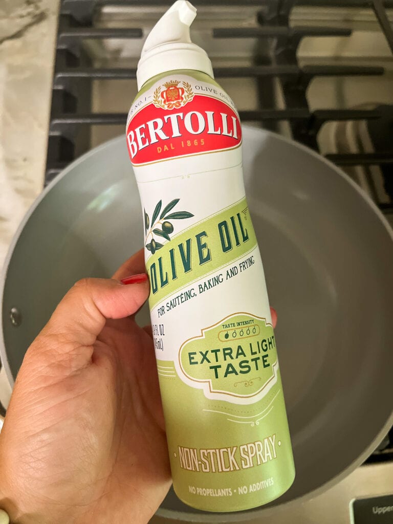 spray pan with olive oil cooking spray