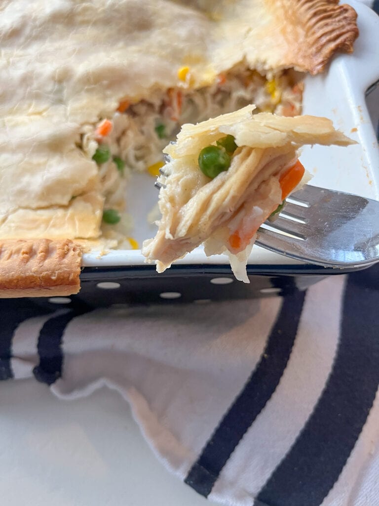 a bite of chicken pot pie casserole recipe on a fork