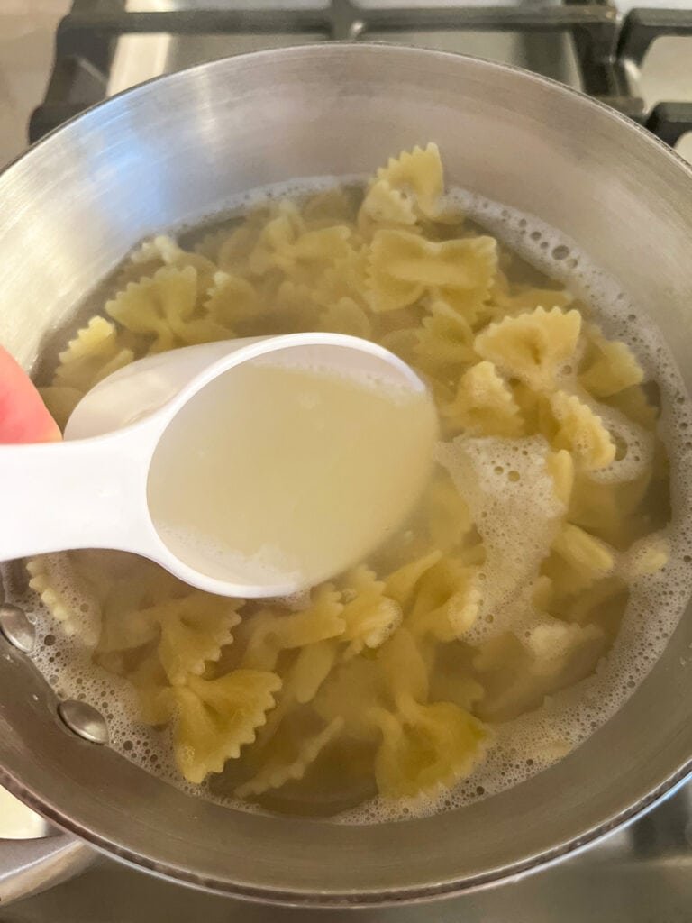 reserve a scoop of pasta water before you drain pasta