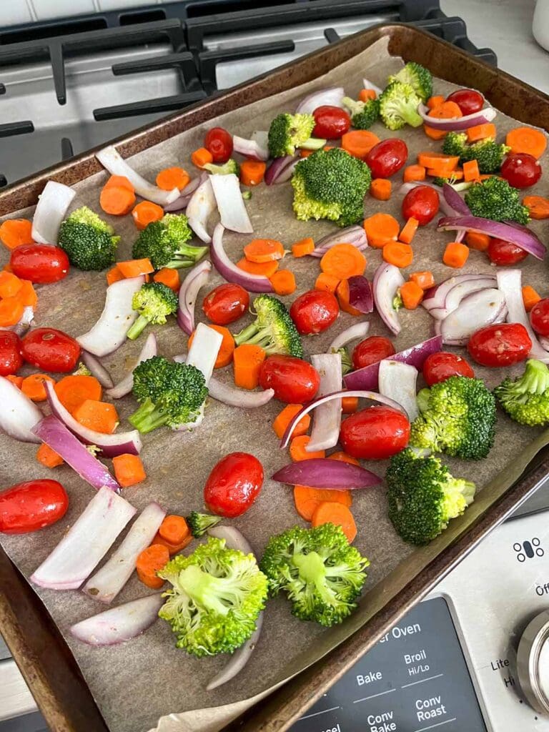 How to Roast Vegetables on a Sheet Pan: veggies on top of parchment paper
