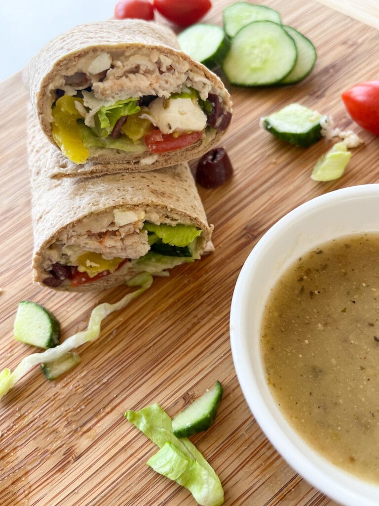 Greek Turkey Wraps with Hummus with veggies and extra dressing