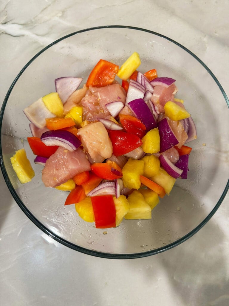 chopped veggies and chicken in a bowl