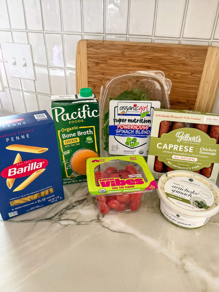 ingredients for the viral Spinach and Artichoke Dip Pasta Bake with Chicken Sausage