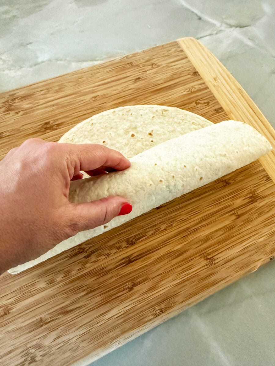 rolling up a tortilla