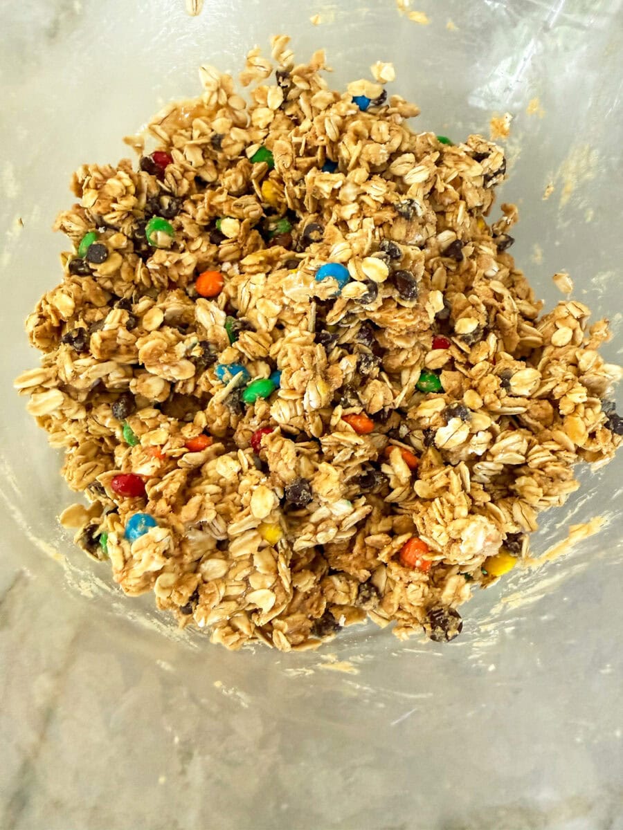 Monster Cookie Protein Ball mixture in glass bowl ready to be scooped